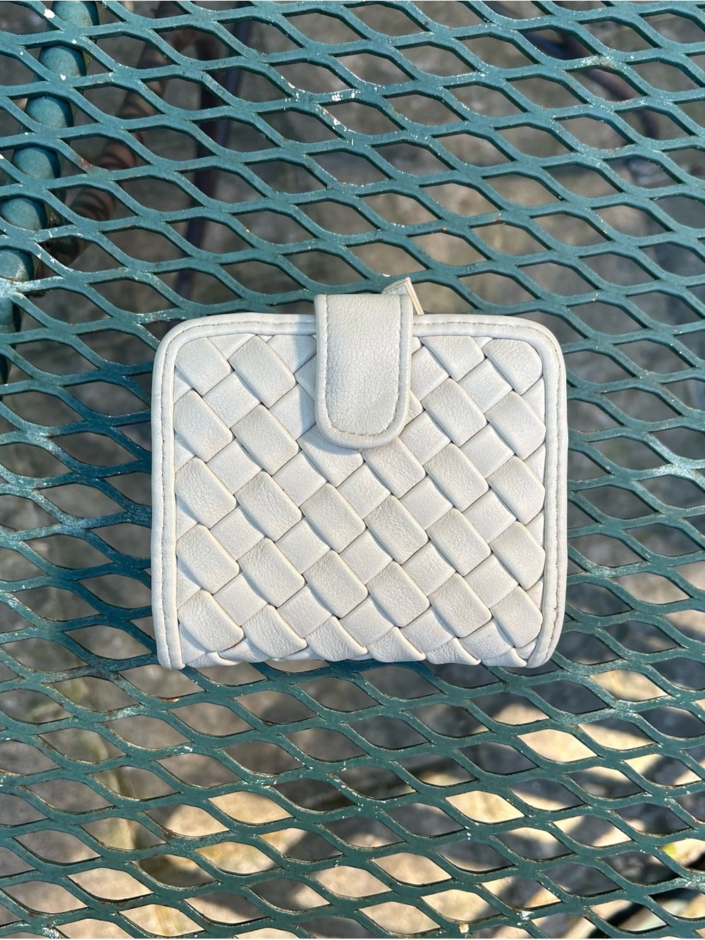 Used White Handheld Wallet